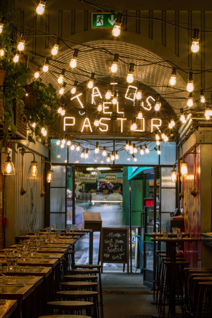 El Pastor London Bridge is set beneath exposed brick arches strung with festoon lights.